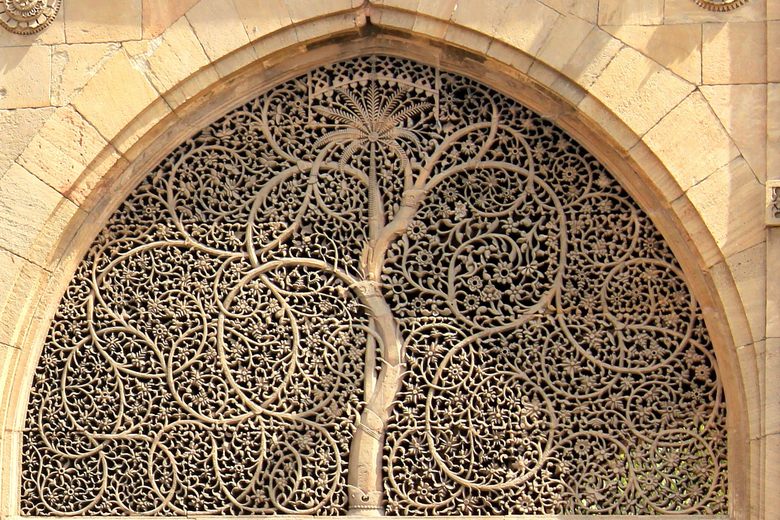 Intricate stone Tree of Life lattice at Sidi Saiyyed Mosque in Ahmedabad